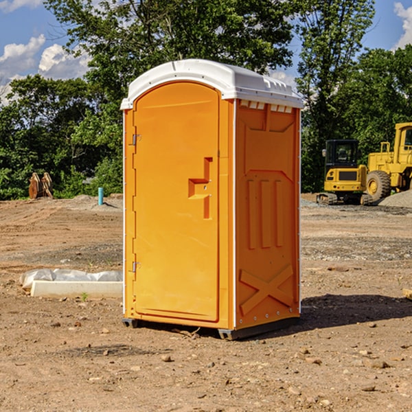 how often are the portable toilets cleaned and serviced during a rental period in Clarke County